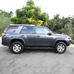 Load image into Gallery viewer, Westin 2014-2017 Toyota 4Runner SR5 PRO TRAXX 5 Oval Nerf Step Bars - Black
