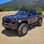 Load image into Gallery viewer, Westin 2024 Toyota Tacoma Outlaw Drop Nerf Step Bars - Textured Black